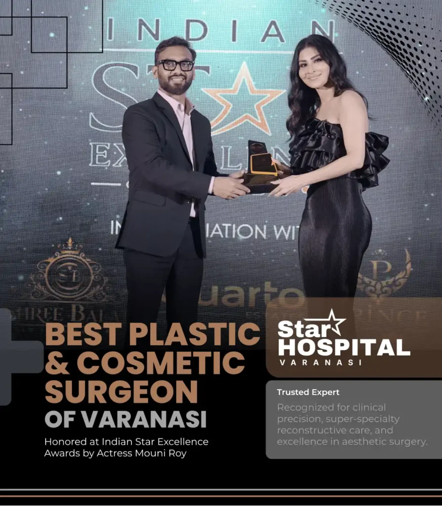 Dr. Gautam Prakash receiving the Best Plastic and Cosmetic Surgeon of Varanasi award from actress Mouni Roy at the Indian Star Excellence Awards.